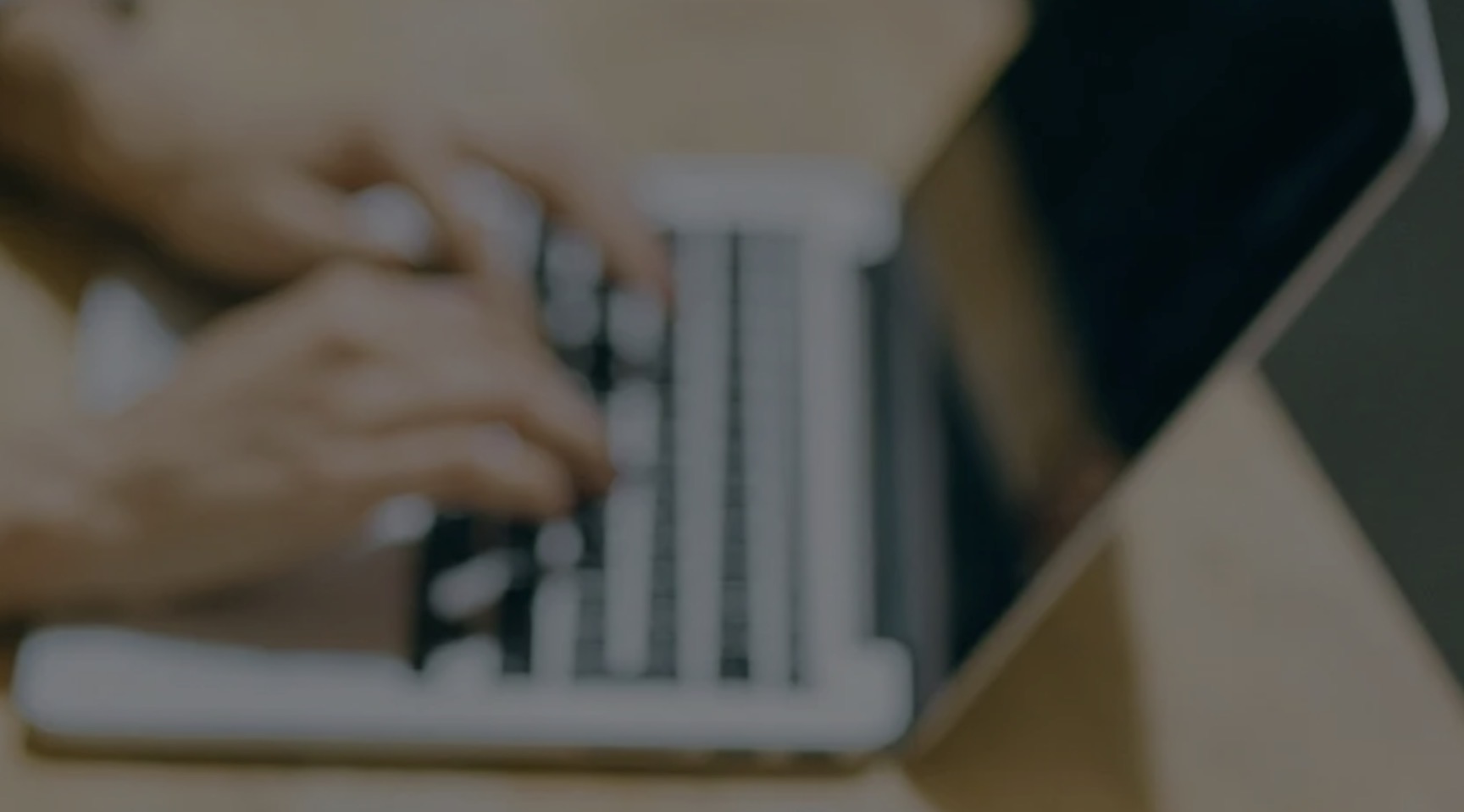 Two hand on a laptop keyboard